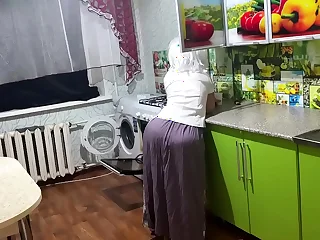 Stepmom is standing in the kitchen and wants anal sex for her mature and big ass